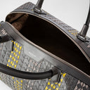 The sleek and spacious travel bag in black Mosaico nappa leather