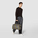 The sleek and spacious travel bag in black Mosaico nappa leather